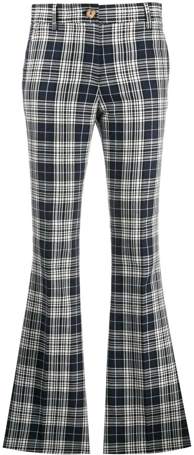 white kick flare trousers