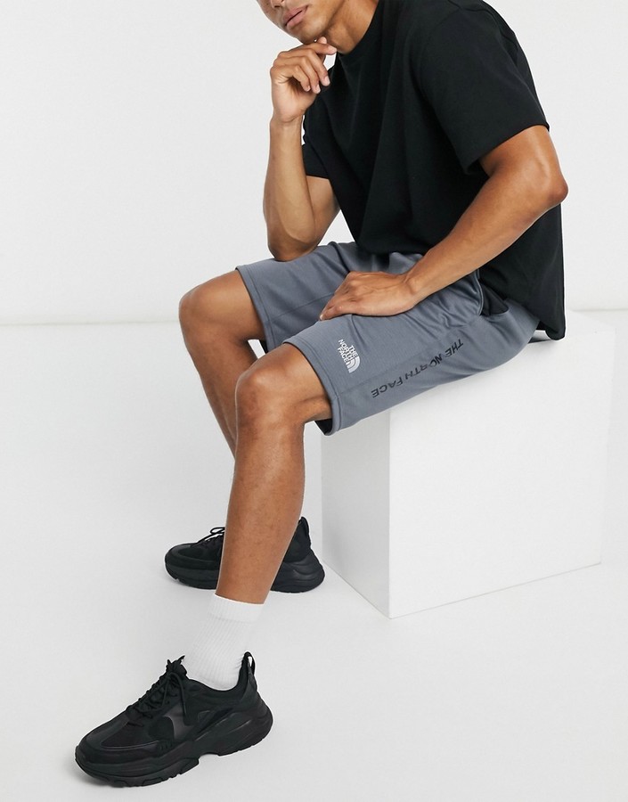 men's train n logo shorts