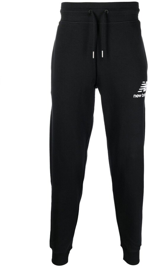 New Balance Essentials Stacked-logo track pants - ShopStyle Joggers &  Sweatpants
