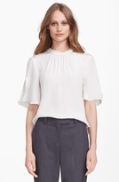 Thumbnail for your product : L'Agence Roll Neck Flutter Sleeve Silk Blouse