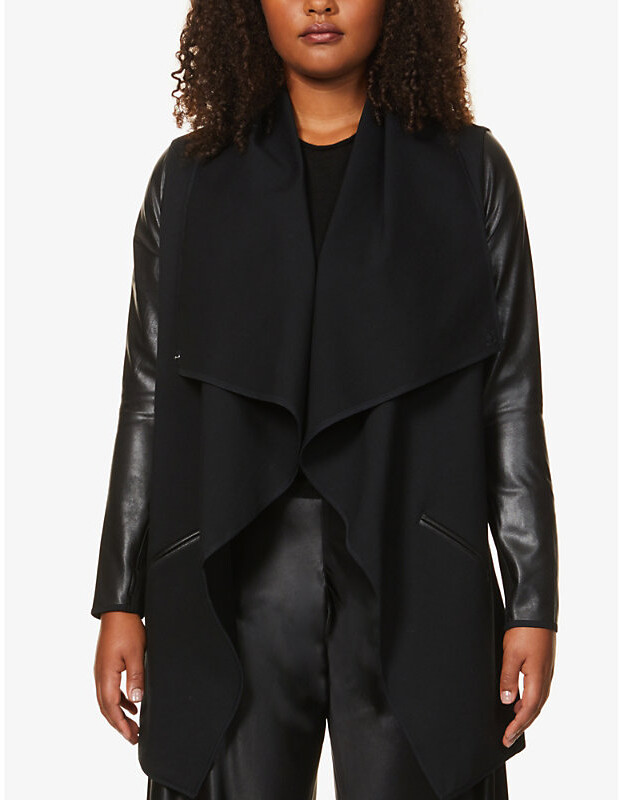 https://img.shopstyle-cdn.com/sim/ef/cb/efcb6f31ba030451945a531bc519bf62_best/spanx-active-womens-very-black-draped-faux-leather-and-stretch-woven-jacket.jpg