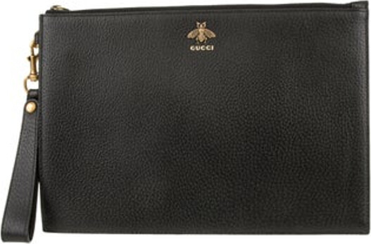 Gucci Portfolio Black Leather Horsebit Accent Gold-Tone Hardware Wrist Strap Canvas Lining & Single Interior Pocket Zip Closure at Top Unfortunately due to restrictions this item may not be eligible for shipping in all areas.