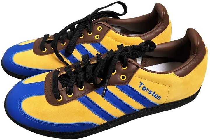 yellow trainers adidas
