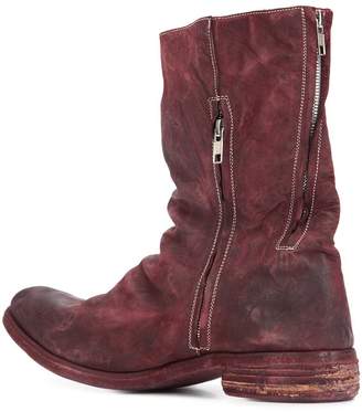 A Diciannoveventitre peaked vamp derby boots