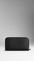 Thumbnail for your product : Burberry Signature Grain Leather Ziparound Wallet