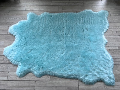 Spectrum Rugs Faux Bison Skin Fur Shag Area Rug in Blue