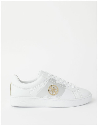 guess black and gold trainers
