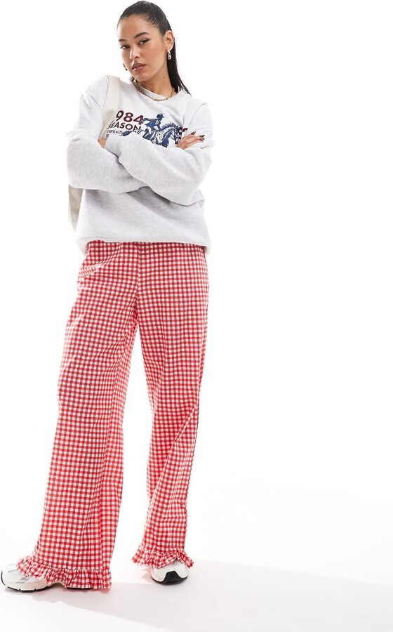 ASOS DESIGN gingham trousers with frill hem in red ShopStyle