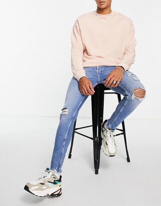 Bershka Super Skinny Jeans With Rips In Dark Blue - ShopStyle