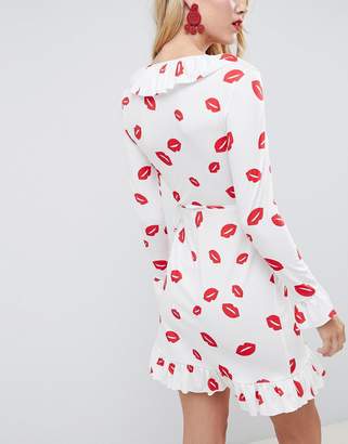 ASOS DESIGN mini wrap dress with frill detail in lip print