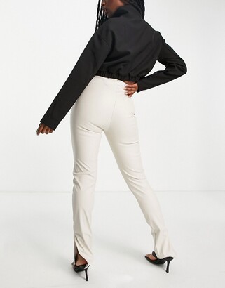 Missy Empire Missyempire leather look skinny pants with side splits in  cream - ShopStyle