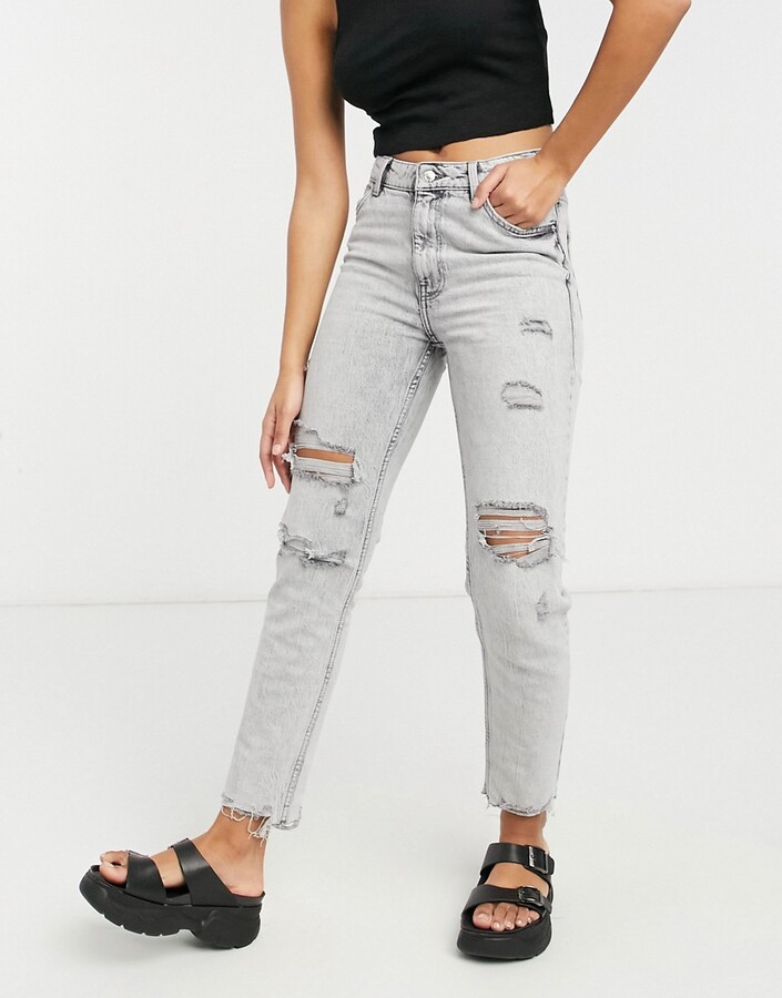 Bershka slim jeans with distressed hem in washed gray - ShopStyle