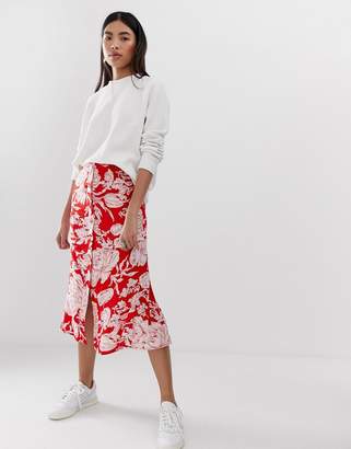 ASOS Design DESIGN floral button front midi skirt with pleat back