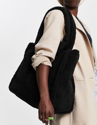 ASOS DESIGN mini faux fur bag with detachable strap