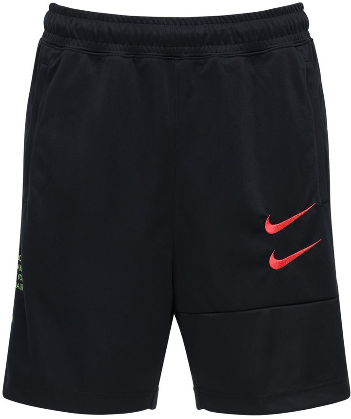 red nike tech shorts