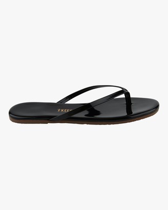 black patent flip flop sandals