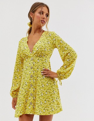 ASOS DESIGN textured mini tea dress with matching scrunchie in yellow floral ditsy print