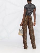 Thumbnail for your product : Versace Python Print Ring-Embellished Trousers
