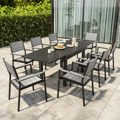 Ebern Designs Koskinen Rectangular 8 - Person Outdoor Dining Set with  Cushions - ShopStyle