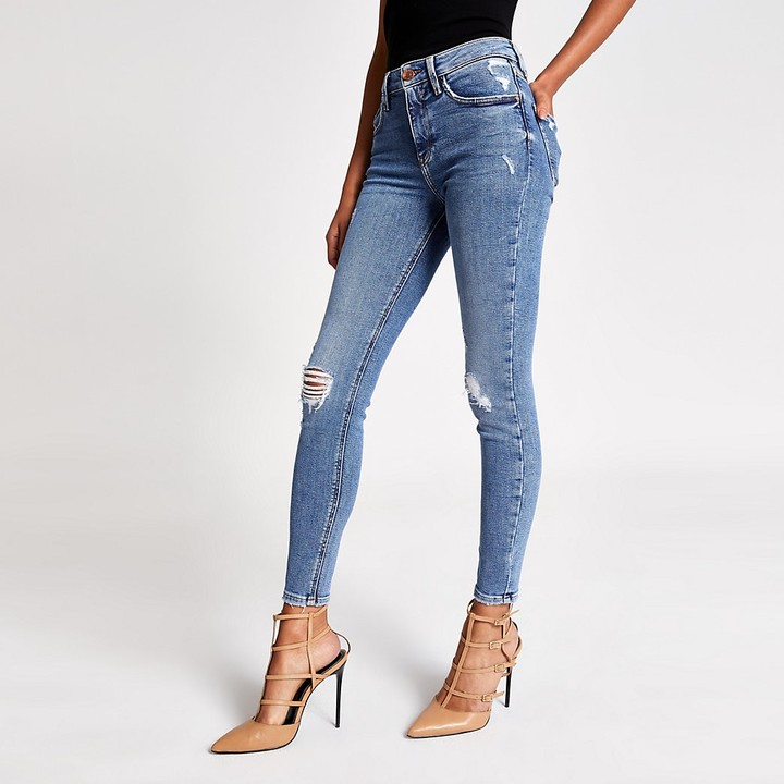 blue ripped super skinny jeans
