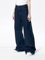 Thumbnail for your product : Marques Almeida Maled Raw Hem Jeans