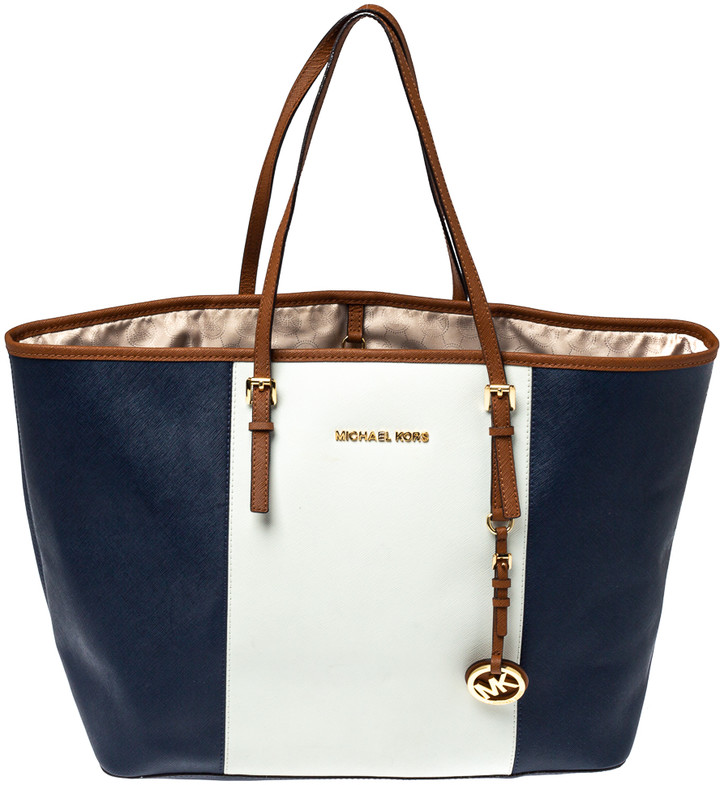 blue and white MK bag