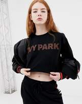 Thumbnail for your product : Ivy Park Metallic Logo Crop Tee-Black