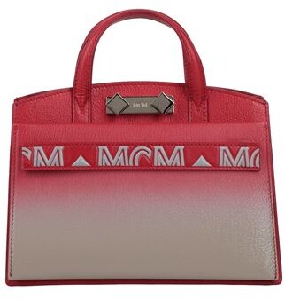 red mcm handbag