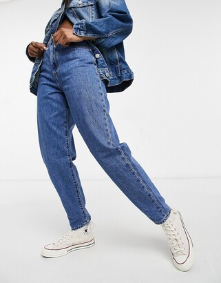 Levi's high loose tapered leg jeans in mid wash - ShopStyle