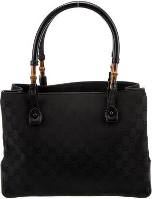 Gucci Tote Black Canvas GG Canvas & Bamboo Accent Tonal Hardware Rolled Handles Canvas Lining & Single Interior Pocket Open Top Protective Feet at Base