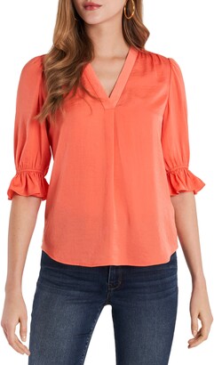 orange ruffle top