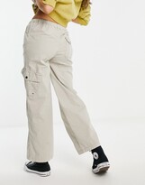 Thumbnail for your product : Reclaimed Vintage inspired 00's low rise nylon cargo pants in stone