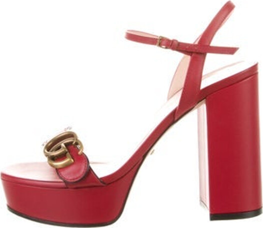 Gucci Leather Sandals Red Double G Logo Scalloped Accent Platform Wrap-Around Straps & Buckle Closure at Ankles Unfortunately, due to restrictions, this item may not be eligible for shipping in all areas.