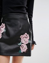 Thumbnail for your product : ASOS Petite PETITE Leather Look Mini Skirt with Embroidery Detail