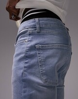 Thumbnail for your product : Topman stretch skinny jeans in light wash blue