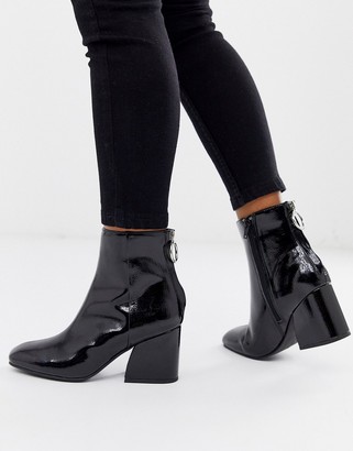 Steve Madden Roxter black patent mid heeled ankle boots with square toe