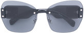 Miu Miu Eyewear - lunettes de soleil oversize à logo