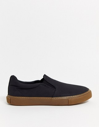 ASOS DESIGN Wide Fit slip on plimsolls in black with gum sole - ShopStyle  Sneakers & Athletic Shoes