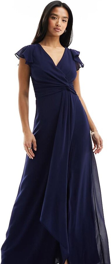 TFNC Petite Bridesmaid flutter sleeve ruffle detail maxi dress in navy ...