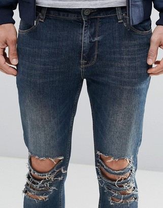 ASOS Skinny Cropped Jeans With Extreme Knee Rips In Blue Wash