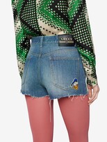 Thumbnail for your product : Gucci x Disney Donald Duck denim shorts