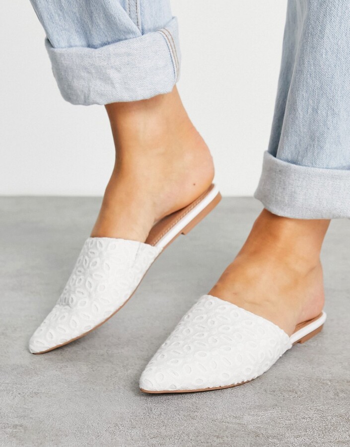 ASOS DESIGN Lava pointed flat mules in white broderie - ShopStyle