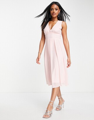 TFNC Bridesmaid chiffon v front midi dress with pleated skirt in whisper pink