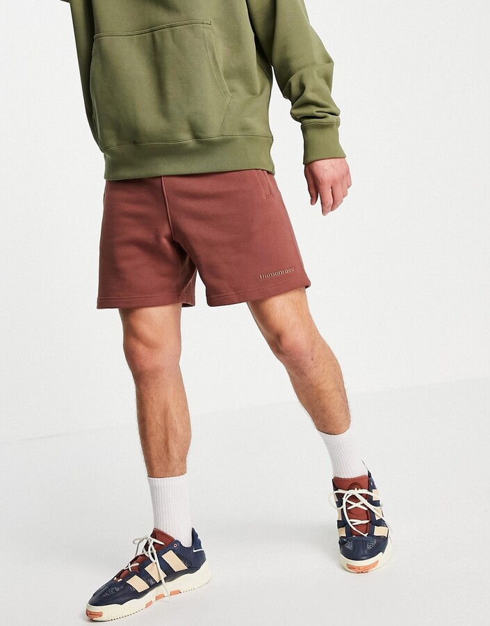 adidas x Pharrell Williams premium shorts in burgundy - ShopStyle