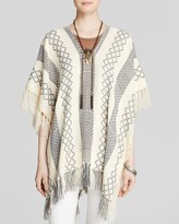 Thumbnail for your product : Free People Poncho - Weave Pattern