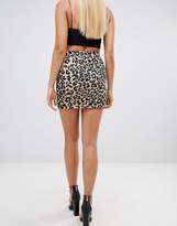 Thumbnail for your product : PrettyLittleThing denim skirt in leopard