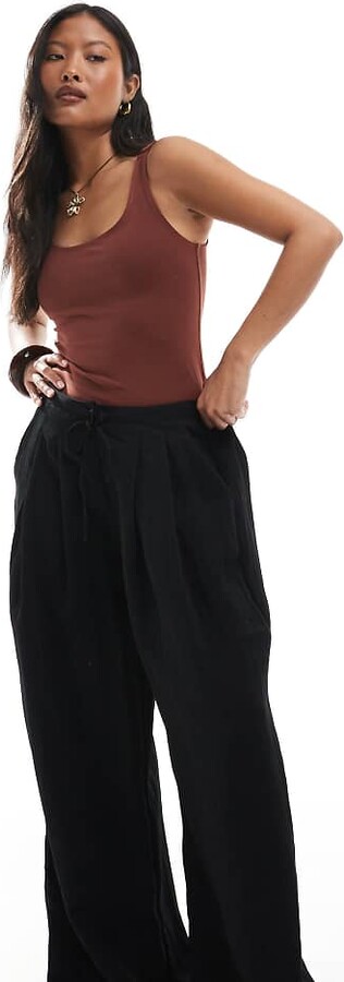 Stradivarius Petite wide leg crinkle tie waist pants in black