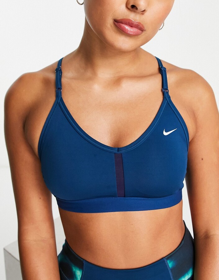 Nike Training Dri-FIT indy v-neck bra in blue - ShopStyle