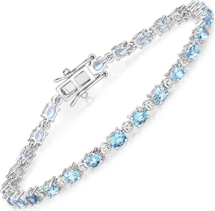 Diana M Aquamarine Oval 4x3mm - 26Pcs + White Diamond F/C Round 1mm ( I1/HI Color ) - 26Pcs ( Box Lock With Double Safety )