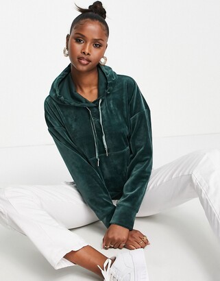 Puma Iconic T7 velour hoodie in dark green - ShopStyle